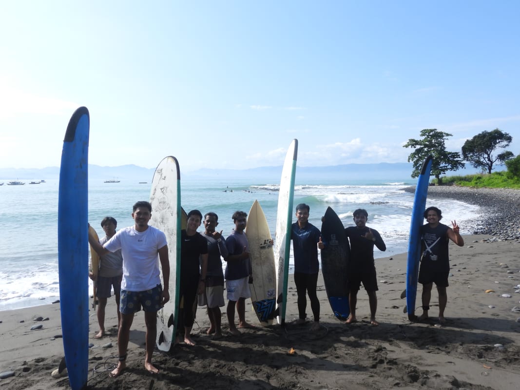 Consistent right-hand reef break wave curling at Cimaja Beach